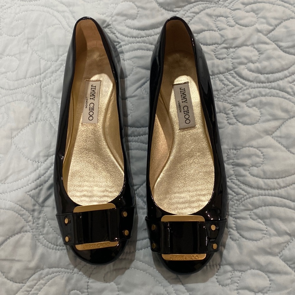 Guaranteed Authentic Jimmy Choo Black Patent Leather Flats.